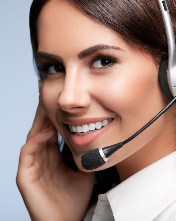 customer-support-phone-operator-in-headset-against-grey